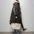 Doudoune longue femme coupe ample, grande capuche chaude
